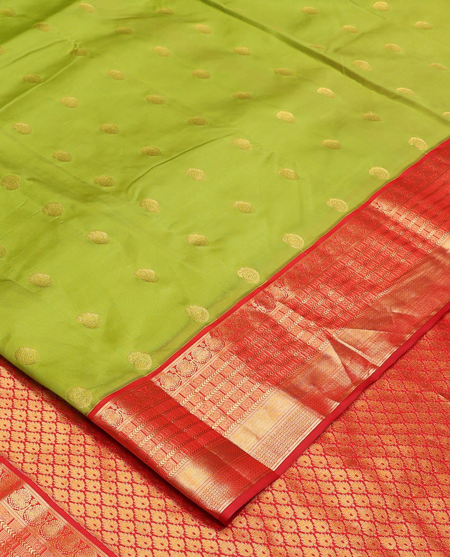 Parrot green manga buttas Vasundhara silk mix, contrast traditional zari border, and intricate pallu
