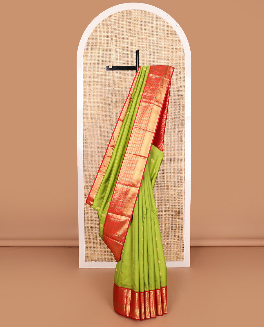 Parrot green manga buttas Vasundhara silk mix, contrast traditional zari border, and intricate pallu