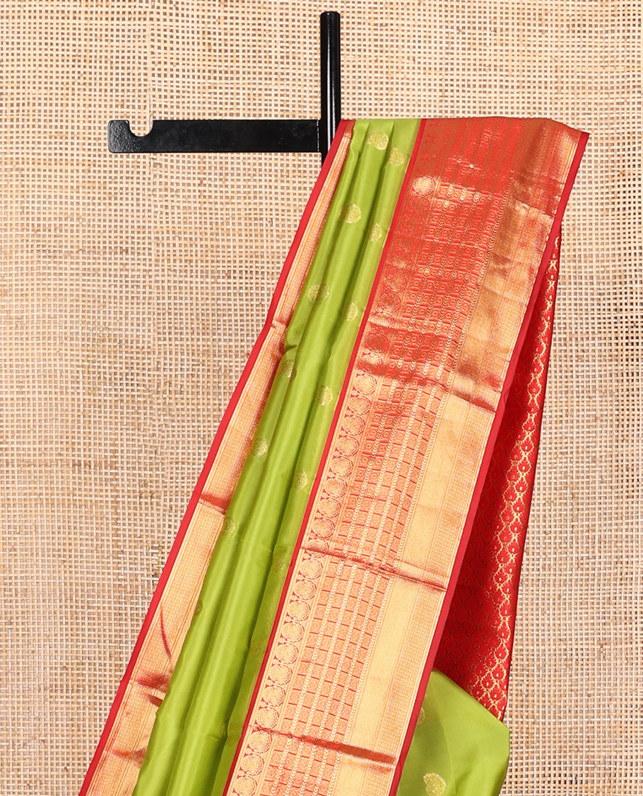 Parrot green manga buttas Vasundhara silk mix, contrast traditional zari border, and intricate pallu