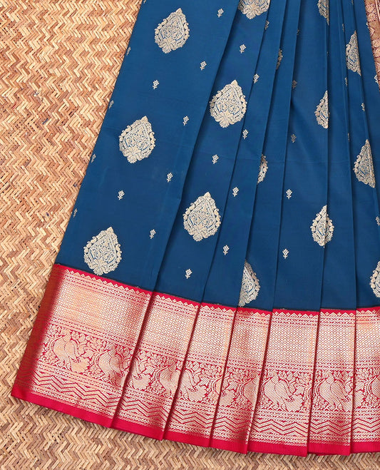 Blue Budget Silk Saree, Gleamed Up with Zari Buttas on Its Body, Complemented by a Contrast Traditional Zari Design Border, Pallu of Intricate Designs, and Paired with a Contrast Blouse
