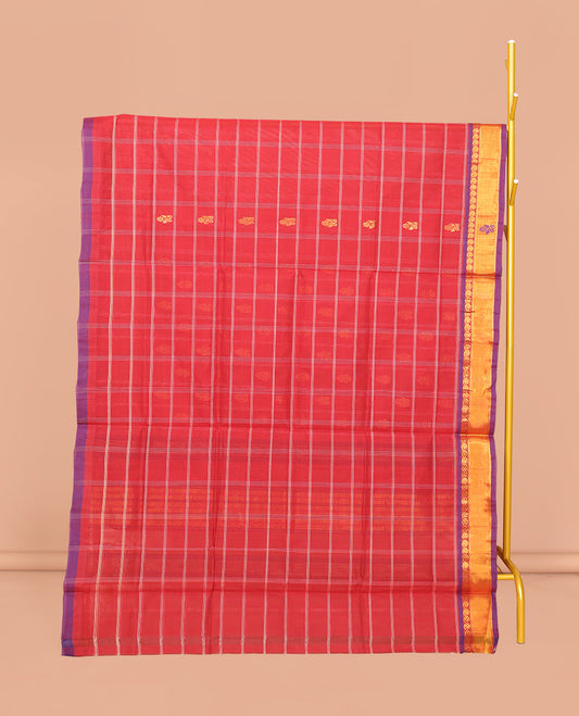 Red Venkatagiri Cotton Saree Decked up with Buttas, a Contrast Zari-Thread Border, Pallu of Stripes, and No Blouse