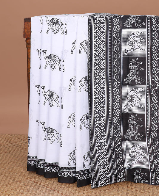 White horse motifs printed mul mul cotton saree, contrast floral creeper printed black border & animal & geometric printed pallu