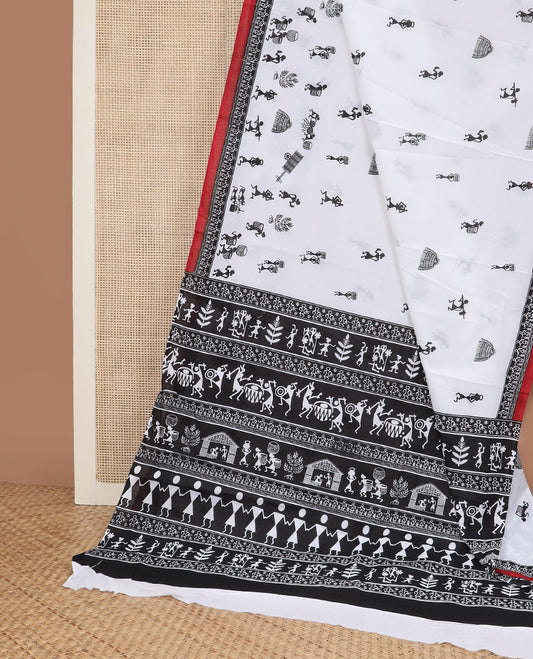 White warli village printed mul mul cotton saree, contrast warli printed black border & pallu of warli motifs print