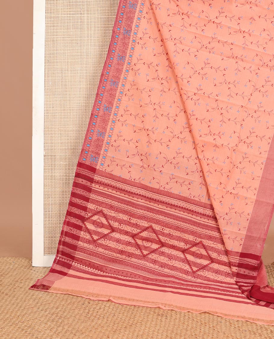 Pale orange floral vine printed chirala cotton saree, contrast floral printed border & diamond patterned floral print pallu
