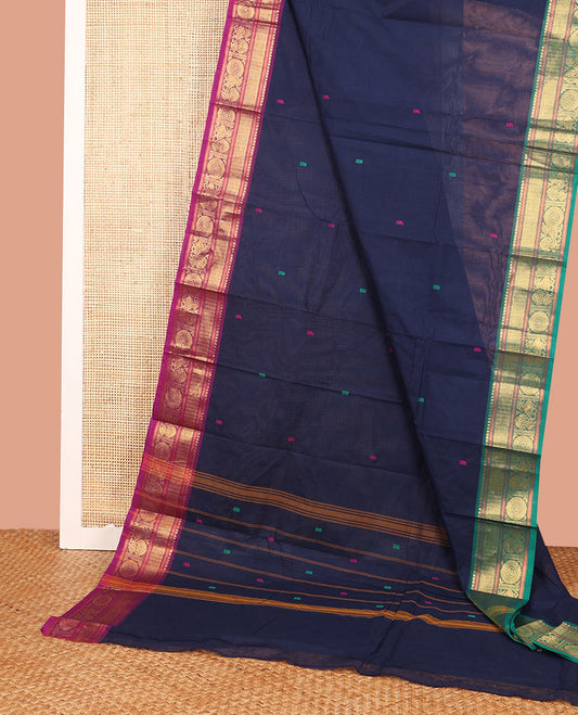 Blue Chettinad Cotton Saree Pretiffied with Thread Buttas All Over Its Body, Complemented by Contrast Ganga-Jamuna Border of Traditional Zari Designs, Pallu of Subtle Stripes and Buttas, and Paired with a Matching Blouse