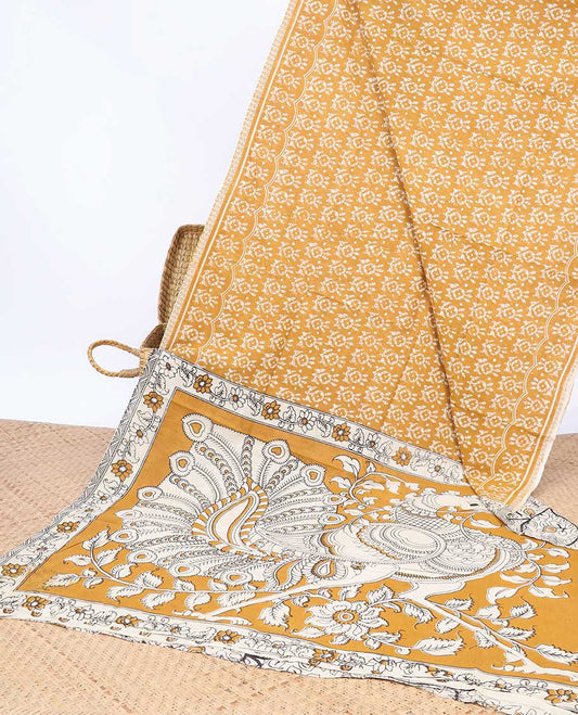 Orange batik machine-printed kalamkari cotton saree, self-border & peacock pallu