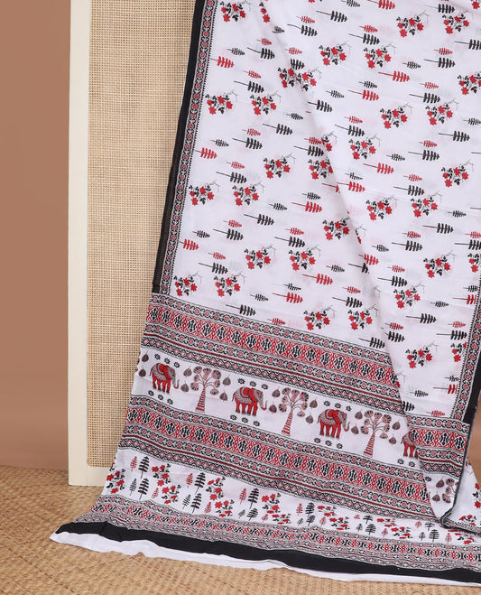 White floral & tree printed mul mul cotton saree, contrast geometric printed border & pallu of geometric patterns, elephant & tree motifs