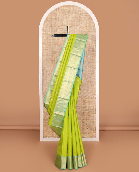 Parrot green zari buttas Vasundhara silk mix, contrast traditional zari border of thilakam motifs, and jaal pallu