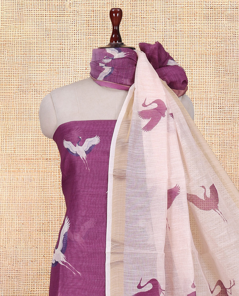 Dark Lavender Semi-Linen Material Churidar, Adorned with Heron Motifs Top, a Plain Santoon Bottom, a Contrast Heron Dupatta