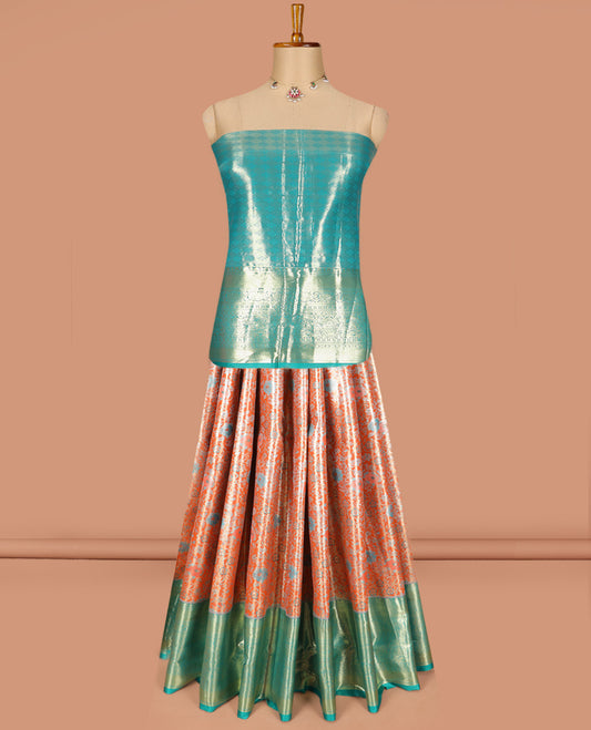 Light Orange Art Silk Material Half Saree Set Featuring Jacquard Skirt, a Contrast Traditional Zari Design Border, a Zari-Jacquard Blouse, and a Dhavani Decked with Zari Designs