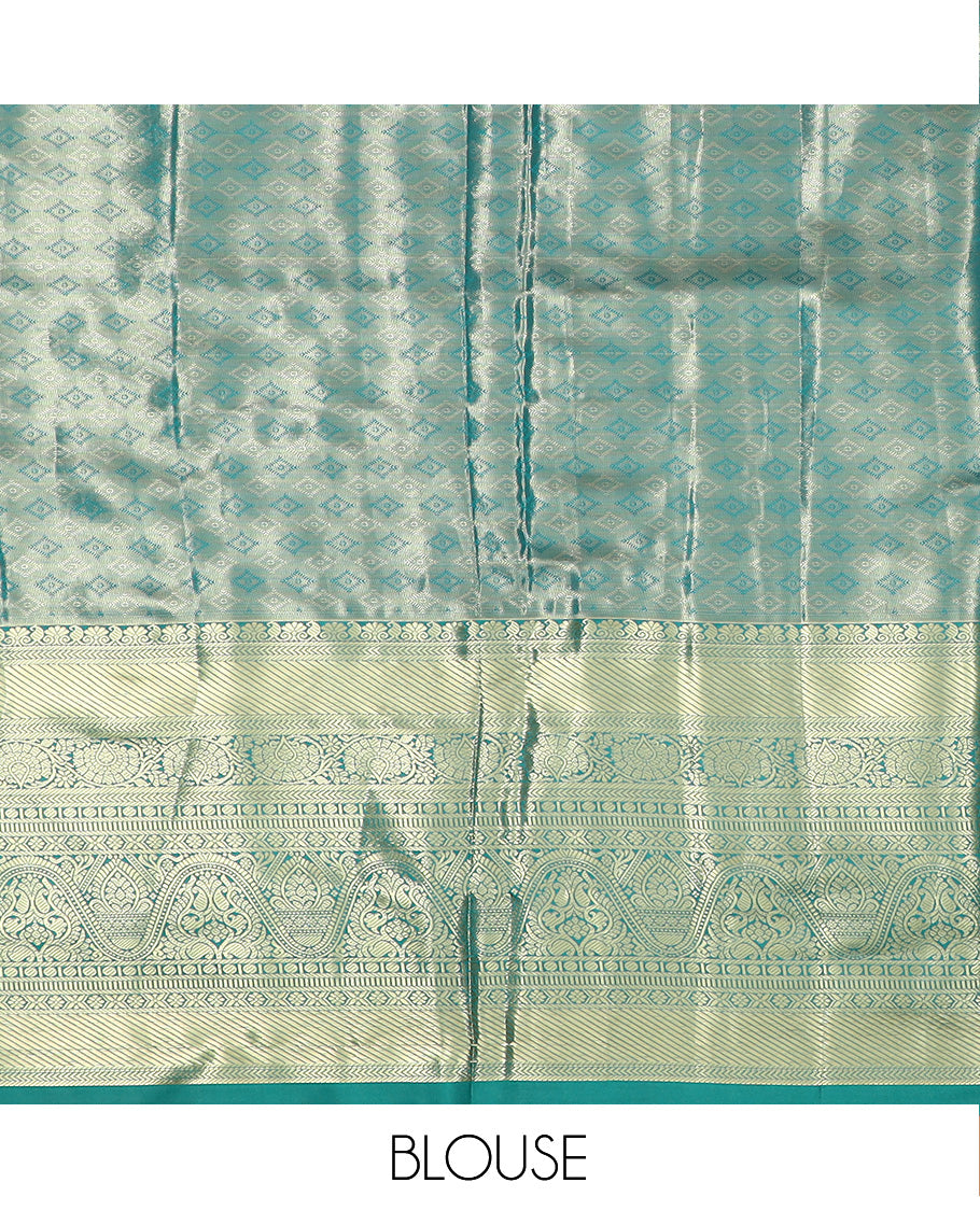 Light Orange Art Silk Material Half Saree Set Featuring Jacquard Skirt, a Contrast Traditional Zari Design Border, a Zari-Jacquard Blouse, and a Dhavani Decked with Zari Designs