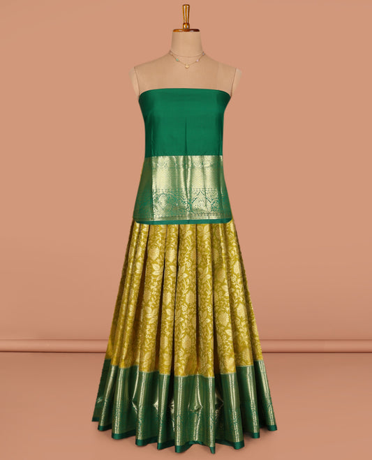 Green Art Silk Pavadai Material Set, Embellished with Floral Jacquard Designs on Its Skirt, Complemented by a Contrast Traditional Zari Design Border, and Paired with a Contrast Blouse