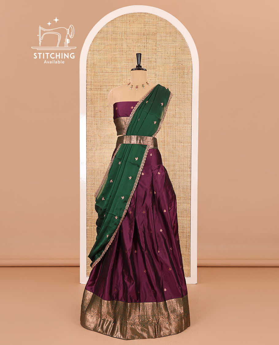 Purple taffeta silk half-saree, zari buttas with contrast traditional zari bordered skirt, matching zari design blouse, and contrast scallop buttas embroidered dhavani