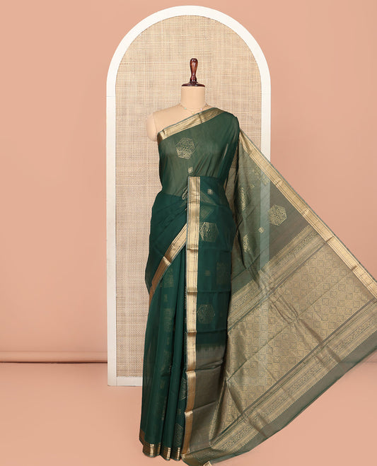 Green Silk Cotton Saree, Embellished with Geometric Buttas All Over Its Body, Highlighted by Traditional Zari Designs Woven Border, Grand Jaal Pallu and Paired with a Matching Blouse