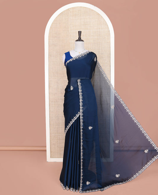 Blue Designer Saree, Mesmerized with Stone Embroidered Buttas on Its Body, Highlighted by Scallop Stone Work Border, Self-Pallu, and Paired with a Matching Embroidered Blouse