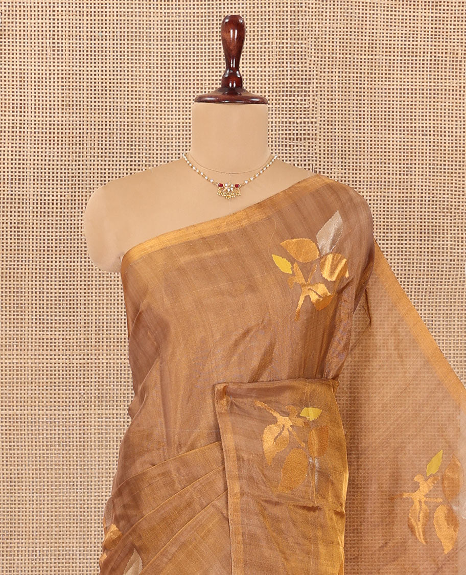 Borderless Brown Uppada Silk Saree Artfully Detailed with Leaf Zari Buttas, Complemented by Contrast Pallu Steeped with Leaf Zari Designs, and Paired with a Contrast Blouse
