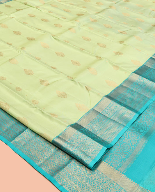 Green Vasundhara Lite Silk Mix Saree, Gleamed Up with Zari Buttas, a Contrast Traditional Zari Border, an Intricate Pallu, and a Contrast Blouse