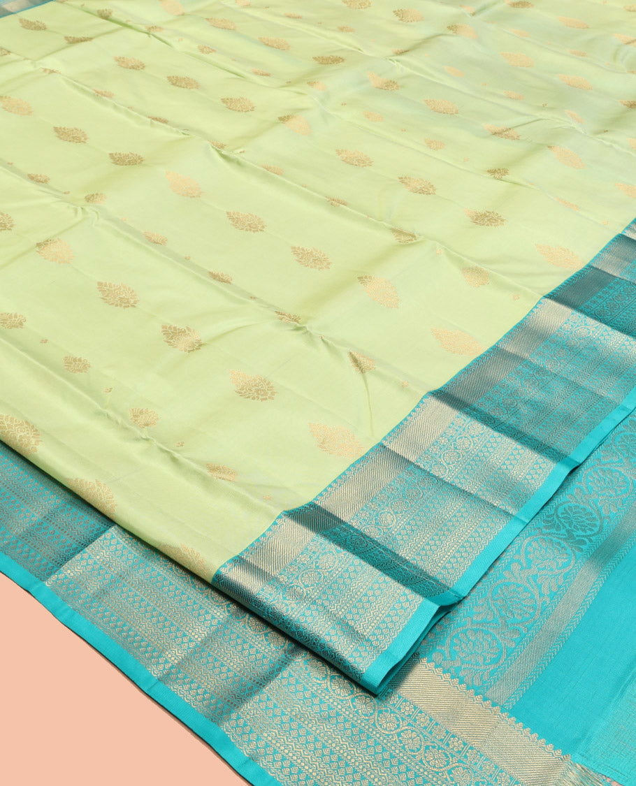 Green Vasundhara Lite Silk Mix Saree, Gleamed Up with Zari Buttas, a Contrast Traditional Zari Border, an Intricate Pallu, and a Contrast Blouse