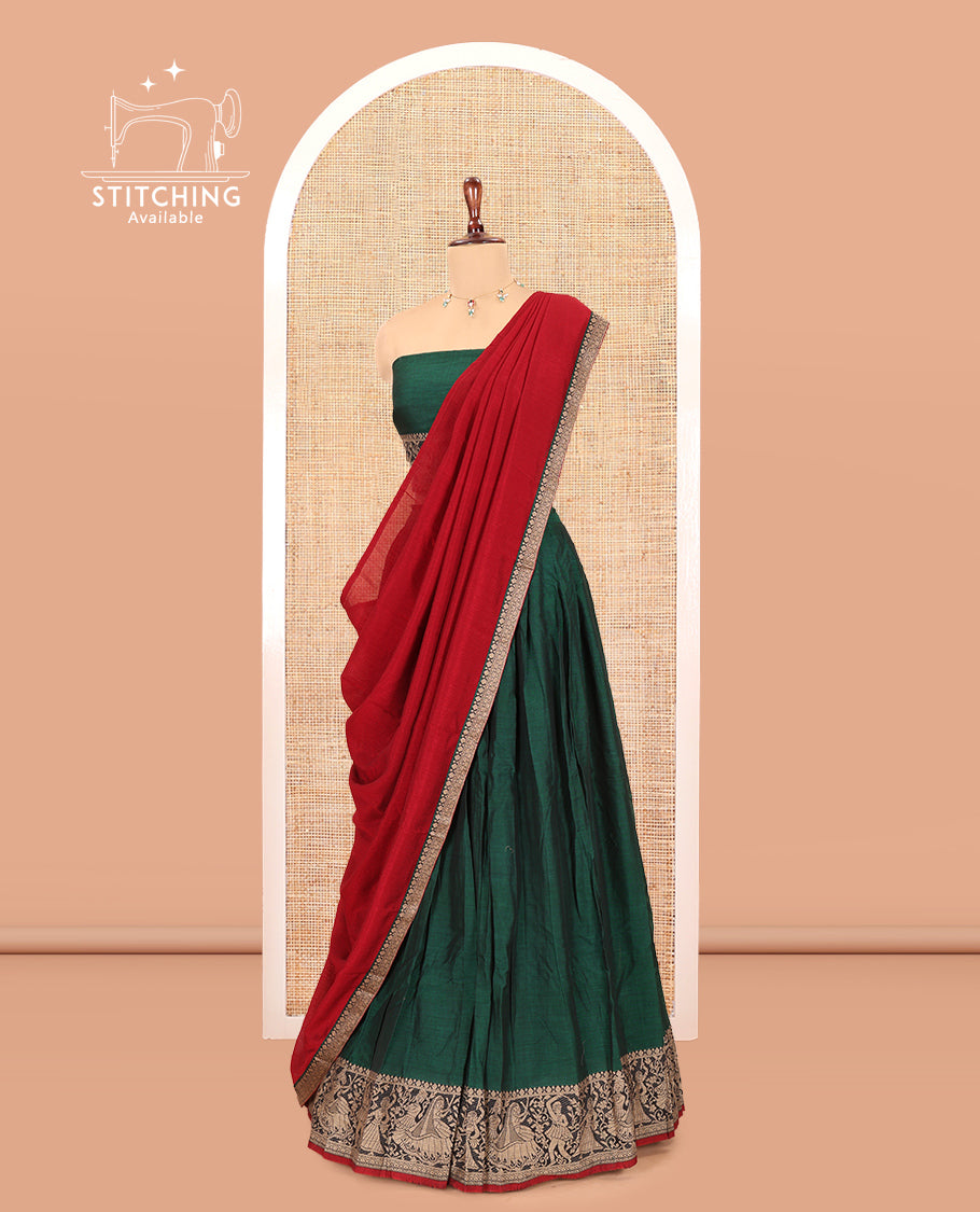 Green Mercerised Cotton Half-Saree Features a Plain Skirt, a Bridegroom Motif Border, a Matching Blouse, a Contrast Dhavani