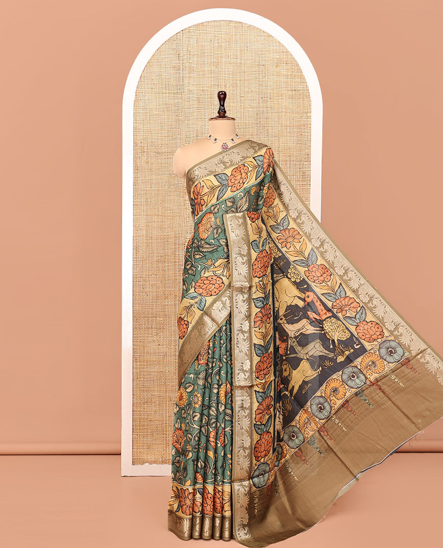 Green Kalamkari Saree, Enriched with Floral Vine Print, Complemented by Contrast Zari Border, Pallu of Fauna Motifs, and a Contrast Blouse