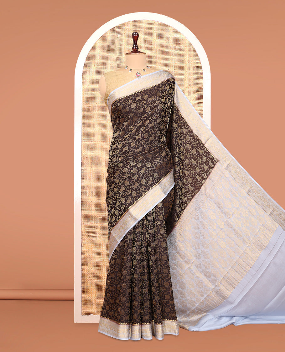 Brown Mysore Silk Saree, Adorned with Pichwai Cow and Lotus Vine, Complemented by a Contrast Traditional Zari Border, Intricate Pallu, and a Contrast Blouse