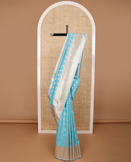 Sky blue leaf buttas semi banaras nylon saree with self traditional zari design border & floral vine design pallu