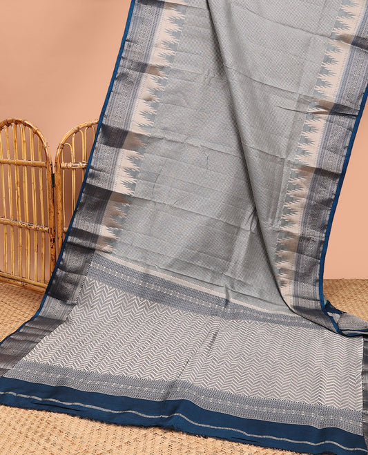 Light grey checked tussar saree with contrast traditional zari design border & chevron design pallu