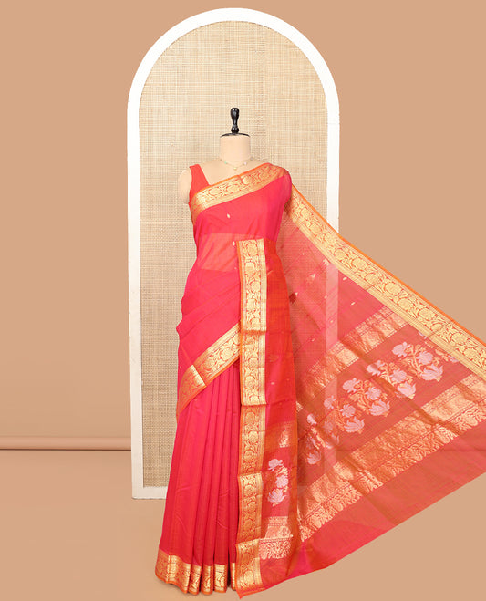Reddish Pink Silk Cotton Saree, Detailed with Zari Buttas and Stripes, a Contrast Floral Creeper Border, Floral Design Pallu, and a Matching Blouse