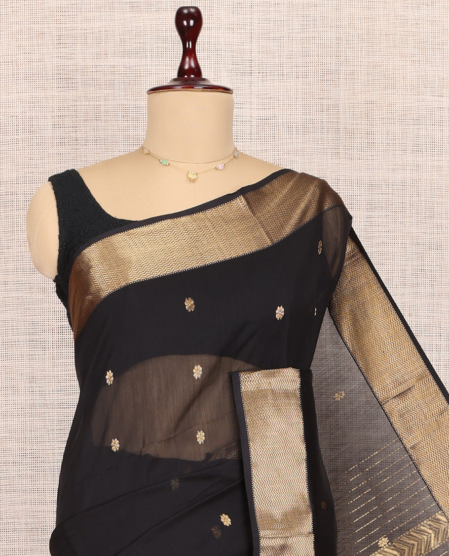 Black Maheshwari Cotton Saree, Accentuated with Buttas, Highlighted by a Traditional Zari Border, Pallu of Chevron Stripes, and a Matching Blouse