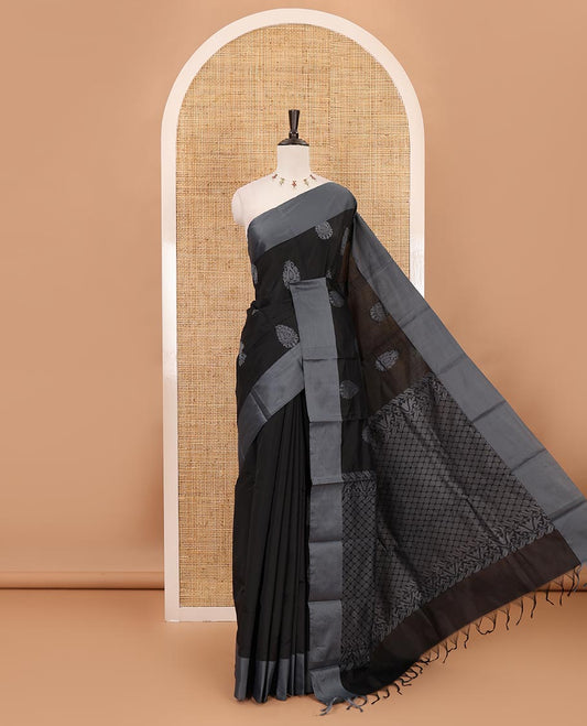 Black butta silk cotton , contrast bawanchi border & thread weaving rich pallu with tussels