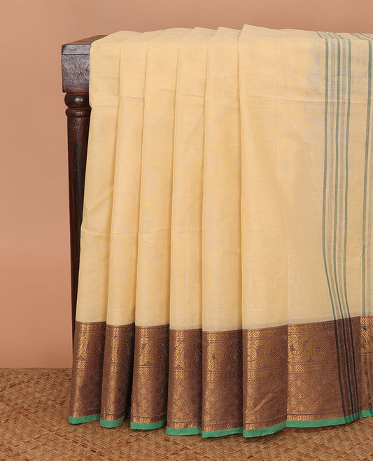Cream plain Chettinad cotton saree, contrast temple traditional zari border, and striped pallu