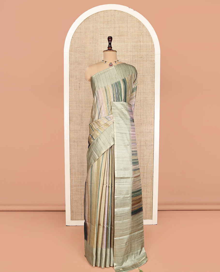 Pista Green Striped Semi-Tussar Silk Saree, Adorned with Vertical Zari Stripes on Its Body, Subtle Zari Border, a Subtle Pallu, and Paired with a Contrast Striped Blouse