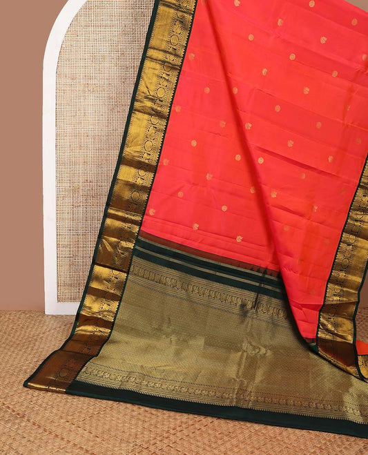 Red buttas silk saree with contrast border of manga, banaras, mayil , mayil kann, poo chakram design & zari design pallu