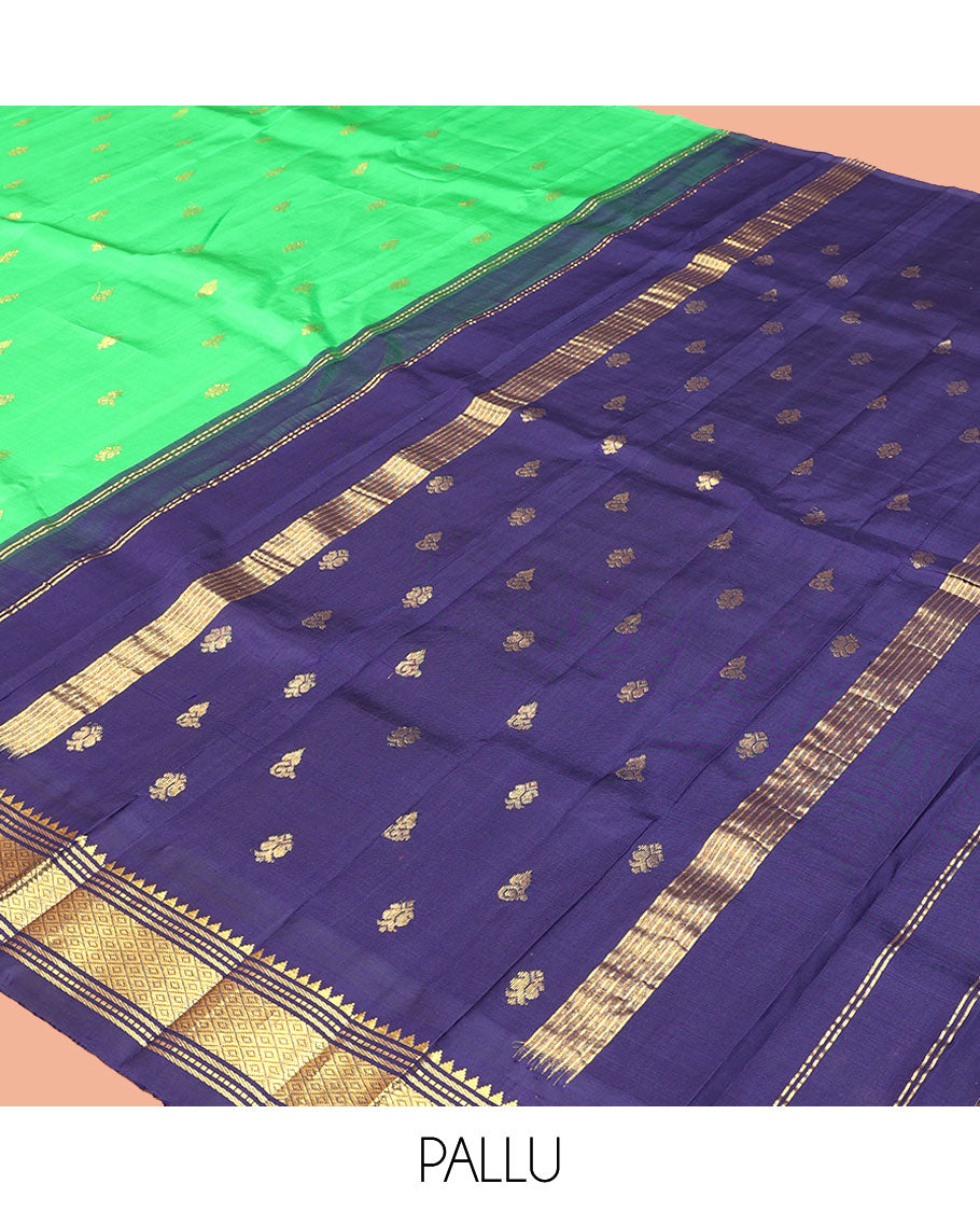 Green Kanchipuram Silk Saree, Accentuated with Zari Buttas, a Contrast One-Sided Korvai Border of Rekku, Banaras, Muthu, and Mayil Kann Designs, a Zari Design Pallu, and No Blouse