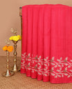 Rani pink jute saree with jamdhani style printed border & printed pallu along with butta design blouse