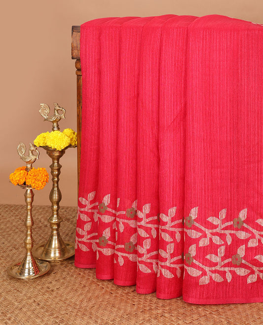 Rani pink jute saree with jamdhani style printed border & printed pallu along with butta design blouse