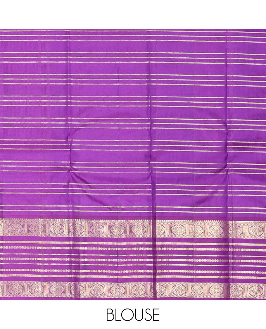 Green Vasundhara Silk Saree, Spotlighted with Zari Checked Design All Over Its Body, Complemented by a Contrast Varisai Pettu Border of Muthu, Poun, and Chakram Designs, Grandly Embellished Pallu of Jaal Designs, and Paired with a Contrast Blouse