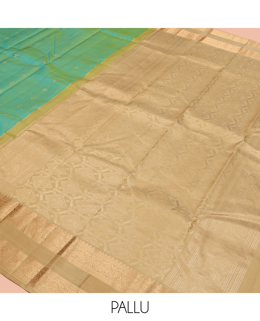 Turquoise Vasundhara Silk Saree, Crafted with Zari Buttas All Over Its Body, Complemented by a Contrast Rettai Pettu Border of Rekku, Muthu, Kathir, and Mayil Designs, Intricately Designed Pallu, and Paired with a Contrast Blouse