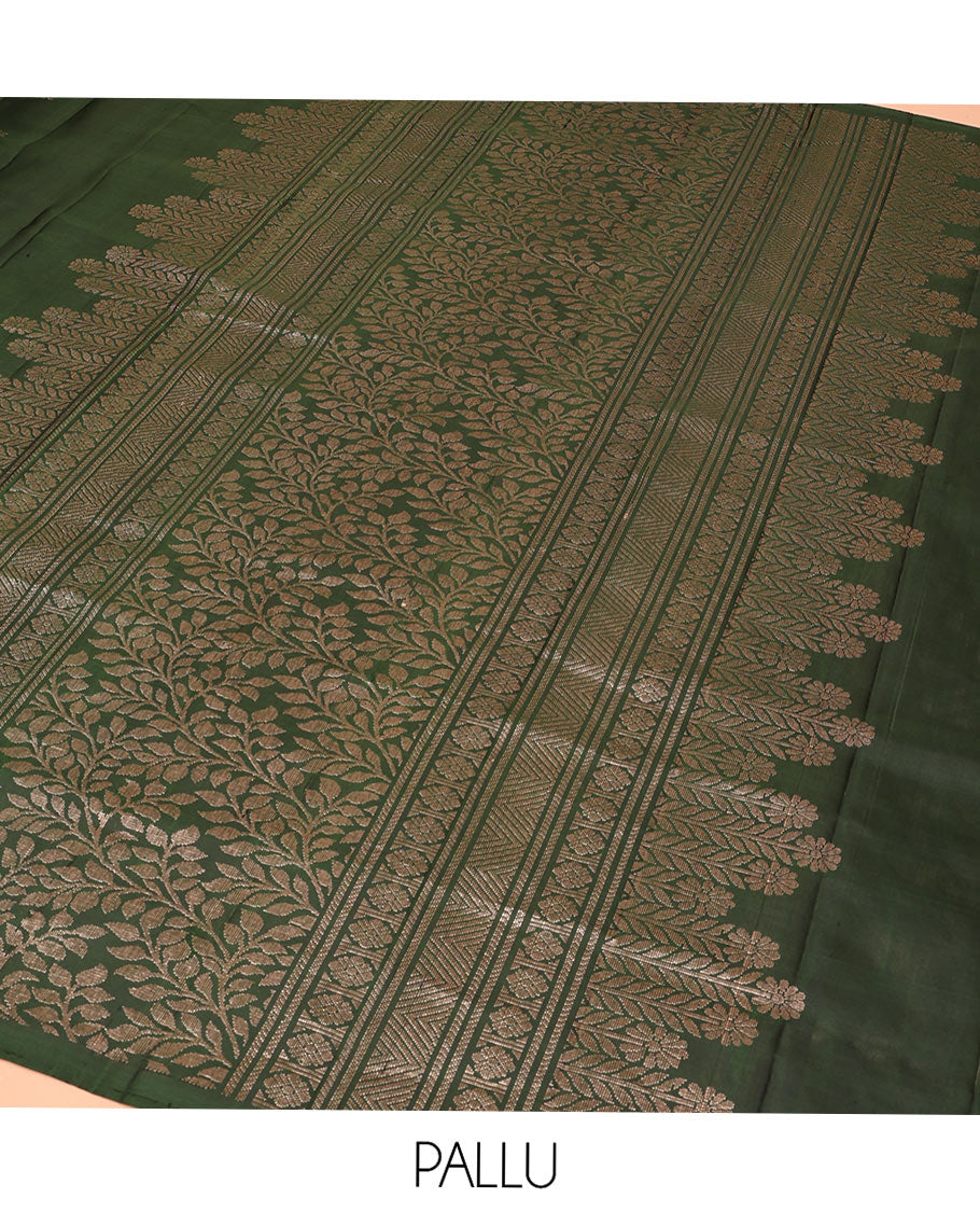 Borderless Green Mayuri Soft Silk Saree, Artfully Detailed with Floral Buttas All Over Its Body, Highlighted by Zari Border of Floral Designs, Opulently Embellished Pallu of Leaf Vine, and Paired with a Matching Blouse