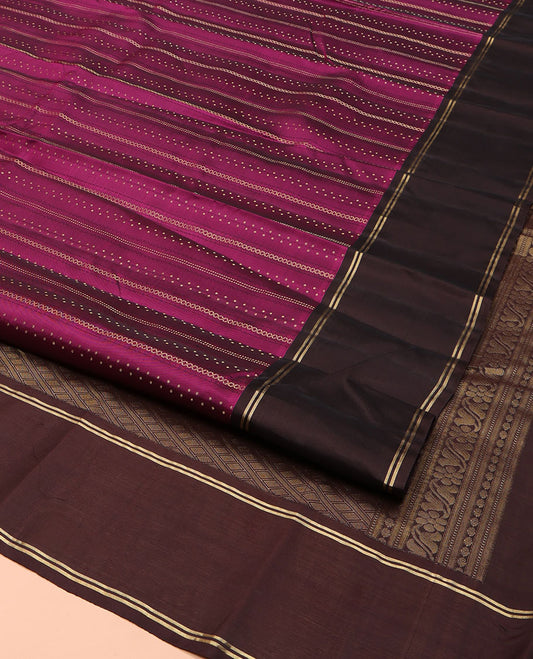 Purple Vasundhara Lite Silk Mix Saree, Meticulously Designed with Zari Buttas on Its Body, Complemented by a Contrast Border of Horizontal Zari Stripes, Sparsely Woven Jaal Pallu, and Paired with a Contrast Blouse
