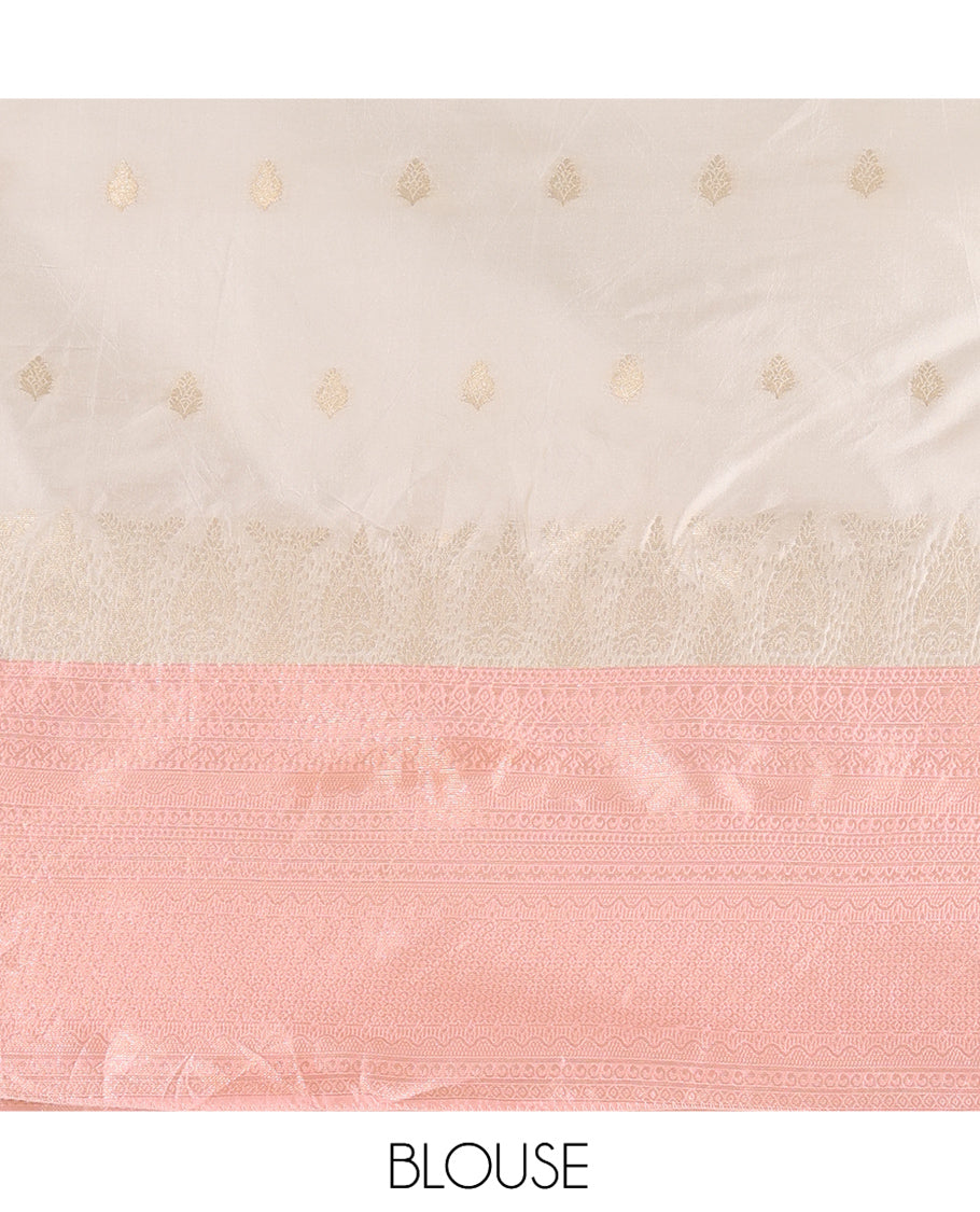 Cream-Peach Semi-Silk Half-Saree, Subtly Sparkled with Zari Buttas Skirt, a Contrast Traditional Zari Border, and a Contrast Dhavani