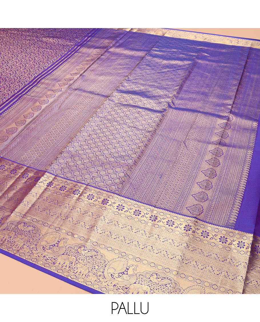 Violet Kanchipuram Wedding Silk Saree, Accentuated with Jacquard Design, a Zari Border of Thilakam, Poun, Diamond, Kodi Visiry, Mayil, and Yaanai, Grand Pallu, and a Matching Blouse