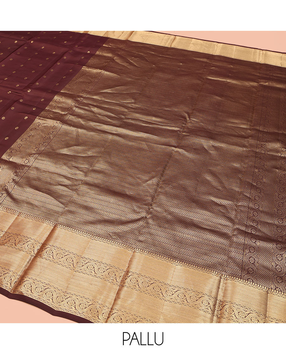 Brown Vasundhara Lite Silk Mix Saree, Decked Up with Zari Buttas All Over Its Body, Highlighted by a Zari Border of Salngai, Muthu, Dhavana Kodi, and Mayil Kann Designs, Pallu of Leaf Vine Designs, and Paired with a Matching Blouse