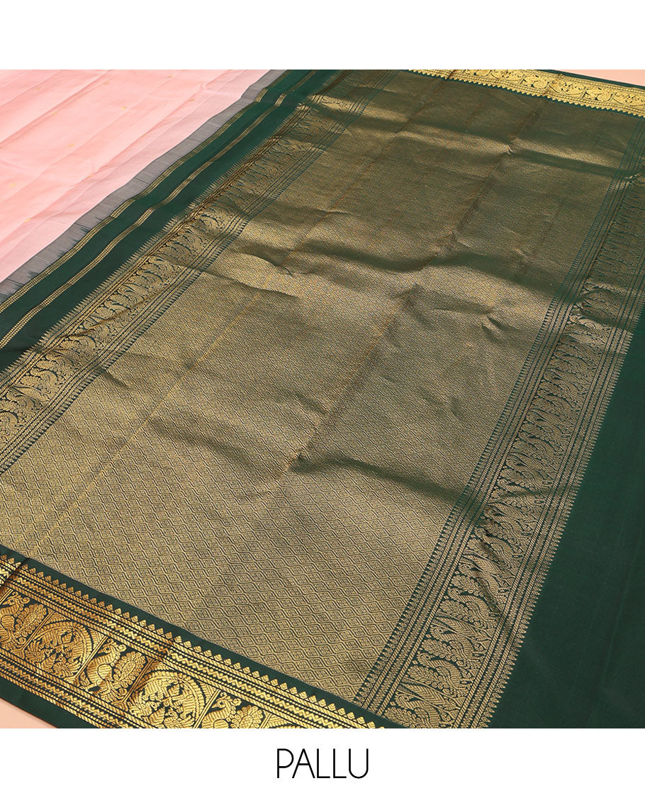 Pink Kanchipuram Silk Saree, Subtly Sparkled with Buttas on Its Body, Complemented by a Contrast Border of Thilakam, Banaras, Muthu, Neli, and Mayil Designs, Grandly Jaal Woven Pallu, and Paired with a Contrast Blouse