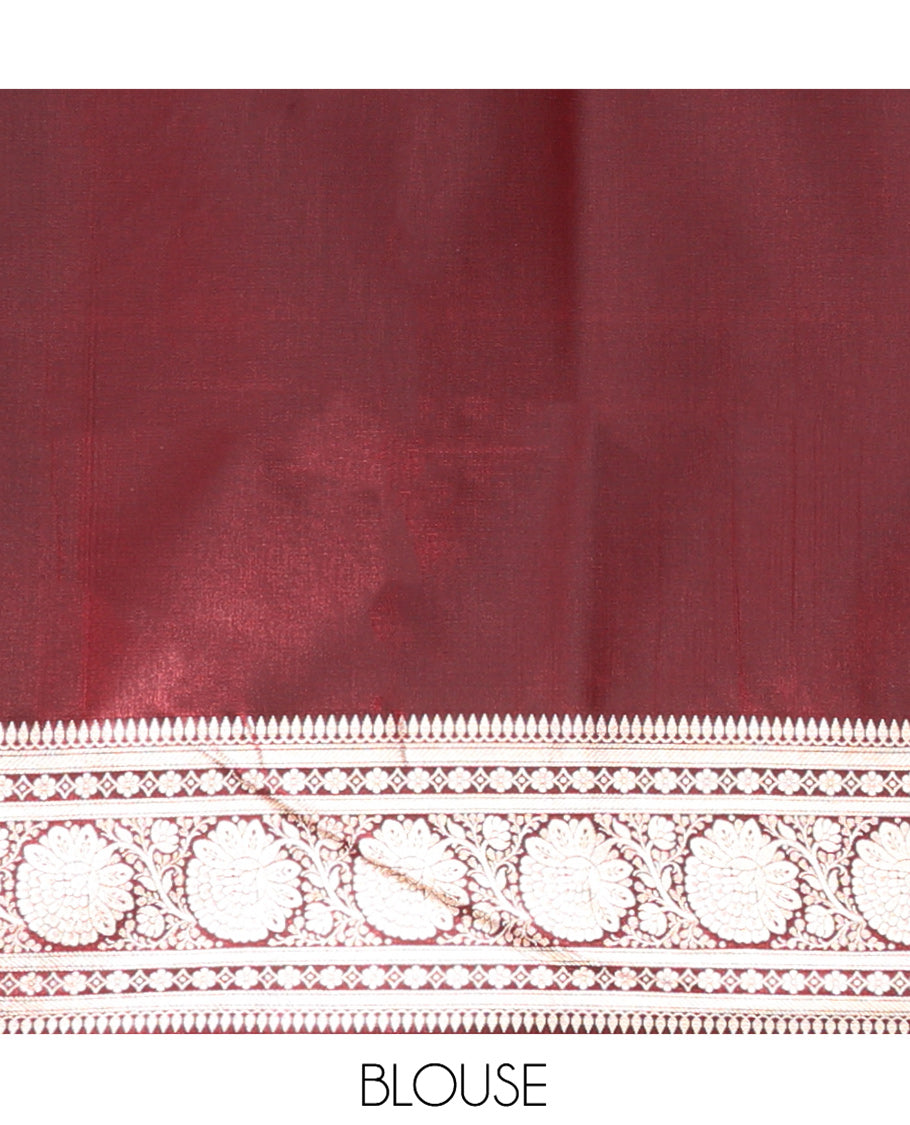 Maroon Banarasi Nylon Saree, Embellished with Zari Buttas, Highlighted by a Floral Creeper Zari Border, Intricate Pallu, and a Matching Blouse