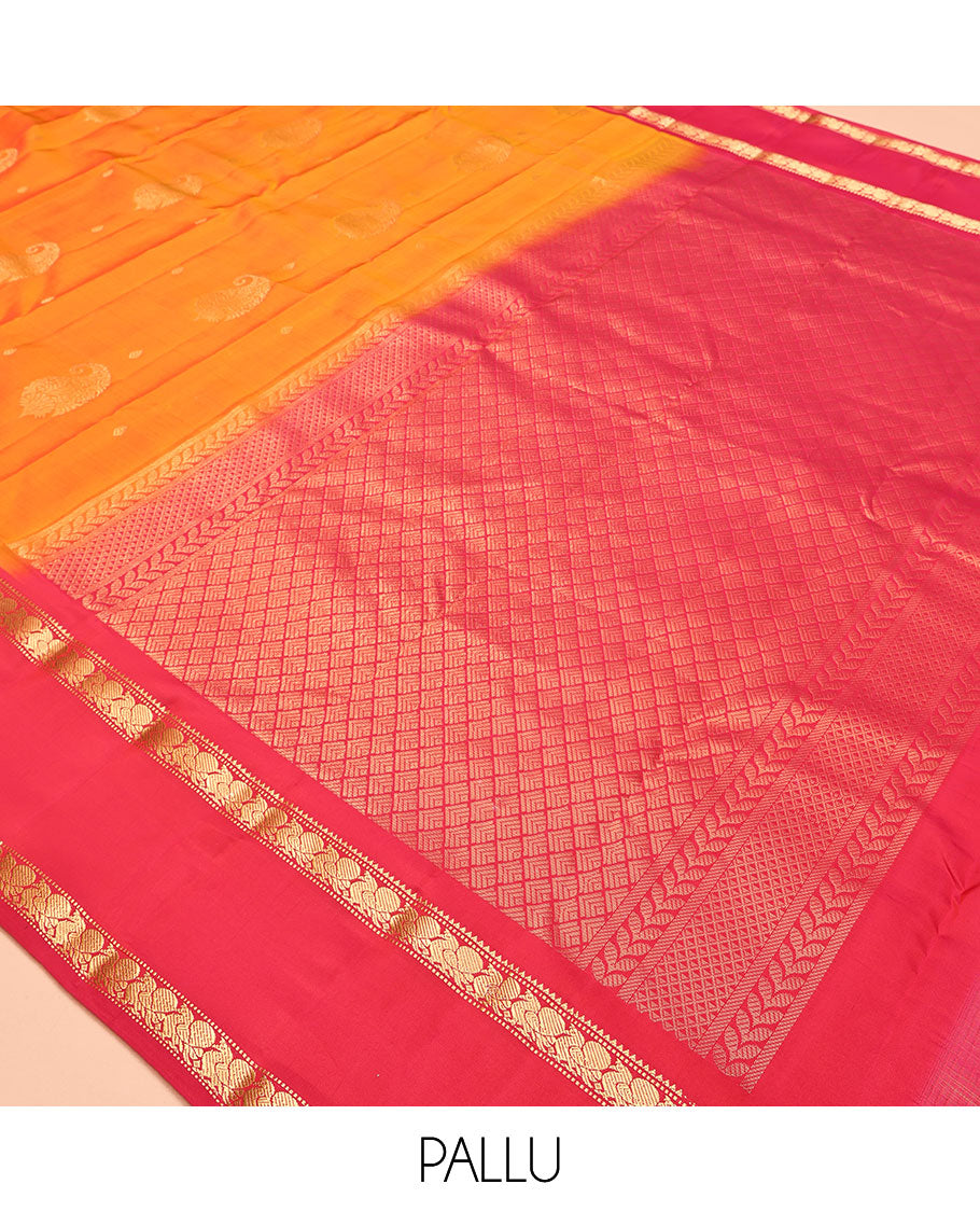 Orange Vasundhara Lite Silk Mix Saree, Ornamented with Zari Buttas, a Contrast Rettai Pettu Border of Mayil Designs, Jaal Pallu, and a Contrast Blouse