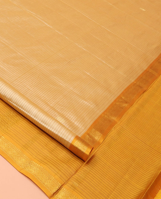 Sandal Kanchipuram Silk Saree Embellished with Vazhaipoo Stripes and Zari Buttas, Complemented by a Contrast Border Featuring Thilakam Mokku, Neli, and Jada Nagam Designs, Sparsely Zari Woven Pallu, and Paired with a Contrast Blouse