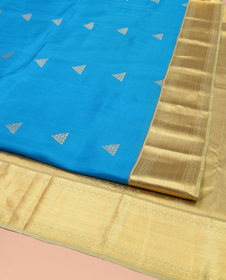 Blue Vasundhara Silk Saree, Decked Up with Zari Buttas  All Over Its Body, Complemented by Contrast Border of Traditional Designs, Pallu of Floral Designs, and Paired with a Contrast Blouse