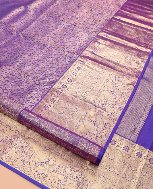Violet Kanchipuram Wedding Silk Saree, Accentuated with Jacquard Design, a Zari Border of Thilakam, Poun, Diamond, Kodi Visiry, Mayil, and Yaanai, Grand Pallu, and a Matching Blouse