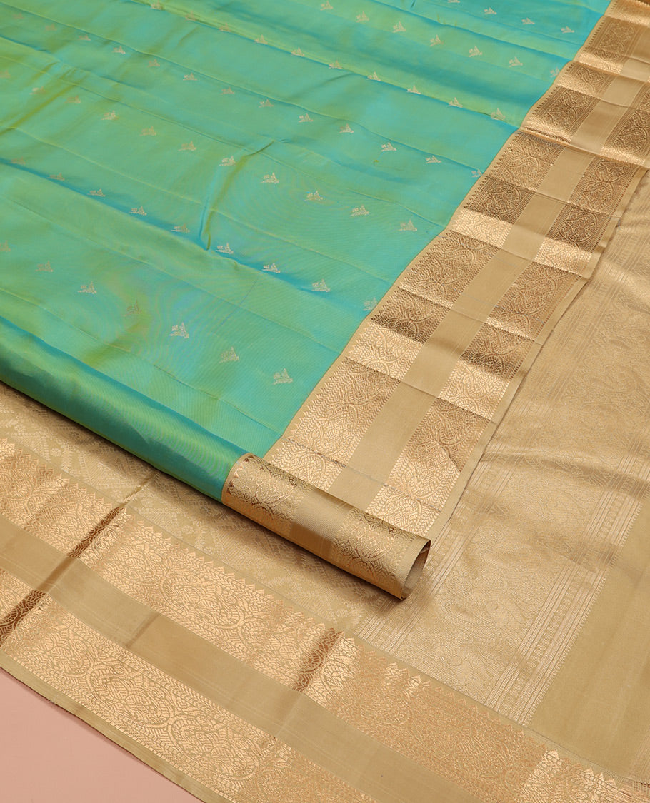 Turquoise Vasundhara Silk Saree, Crafted with Zari Buttas All Over Its Body, Complemented by a Contrast Rettai Pettu Border of Rekku, Muthu, Kathir, and Mayil Designs, Intricately Designed Pallu, and Paired with a Contrast Blouse